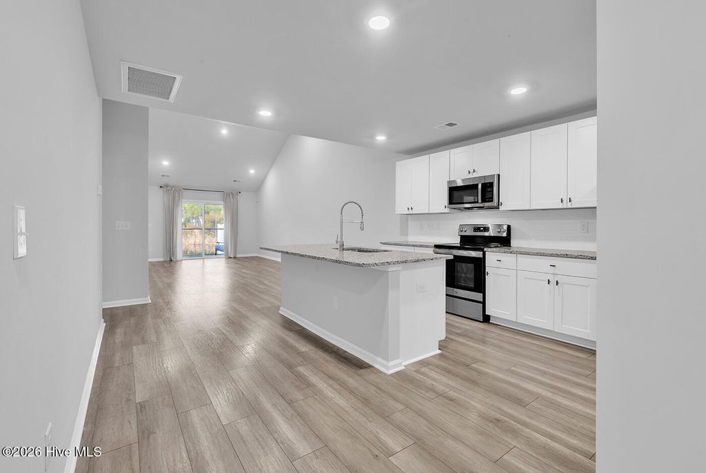 Photo of 6514 Green Fennel Avenue SW, Ocean Isle Beach, NC 28469 (MLS # 100553635)