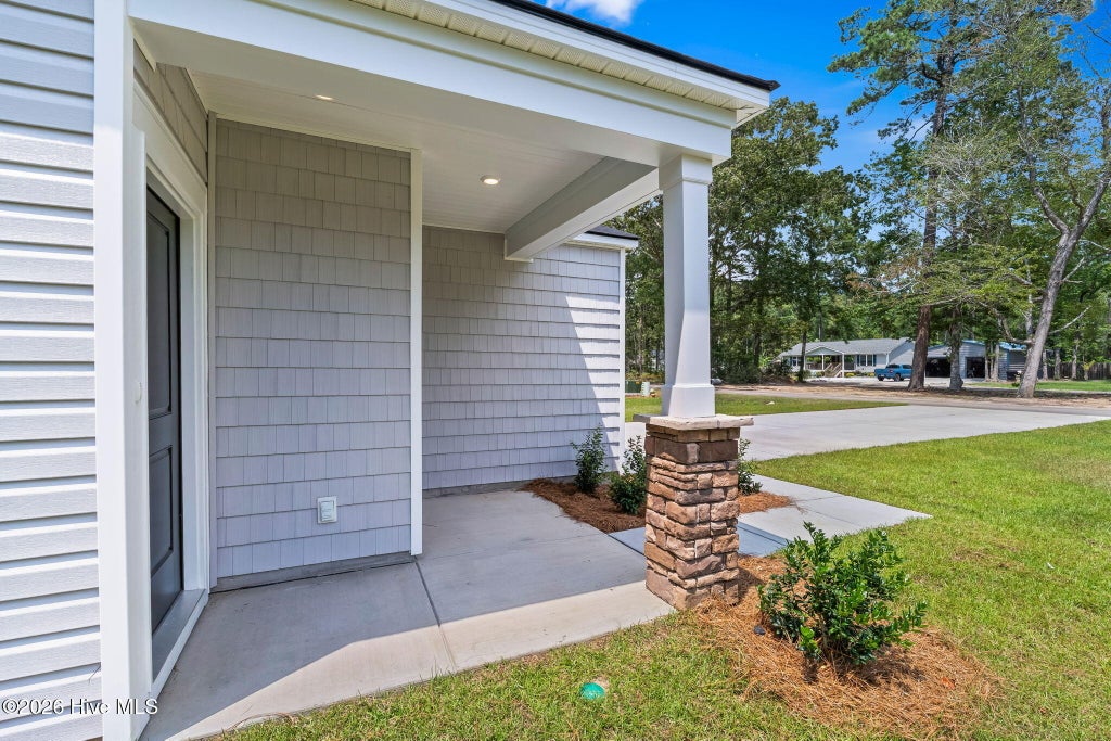 Photo of 1037 Harbor Drive, Calabash, NC 28467 (MLS # 100599379)