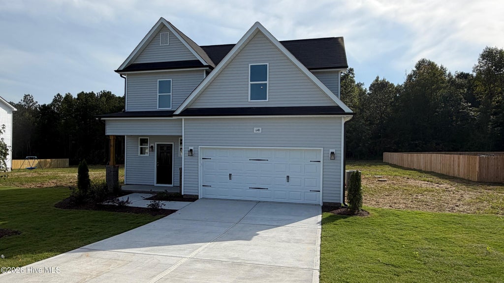 Photo of 648 Springtooth Drive, Zebulon, NC 27597 (MLS # 100568509)
