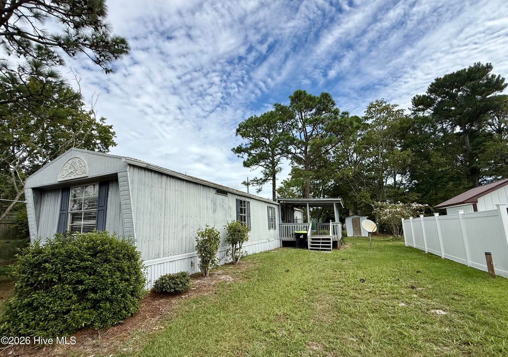 Photo of 919 Pineclair Drive SW, Calabash, NC 28467 (MLS # 100604192)