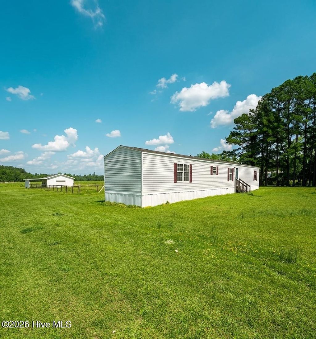 Photo of 3231 Hudsons Crossroads Road, Greenville, NC 27858 (MLS # 100565775)