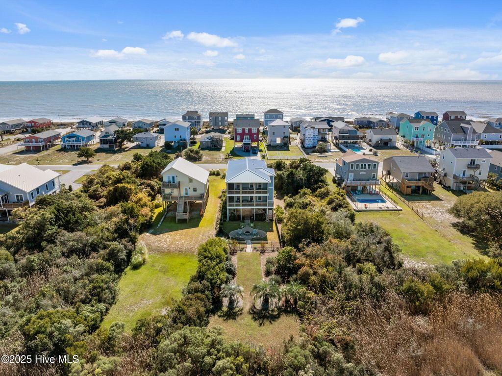 Photo of 714 W Dolphin Drive, Oak Island, NC 28465 (MLS # 100543391)