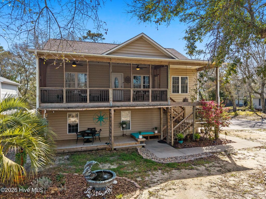 Photo of 1401 E Oak Island Drive, Oak Island, NC 28465 (MLS # 100562755)