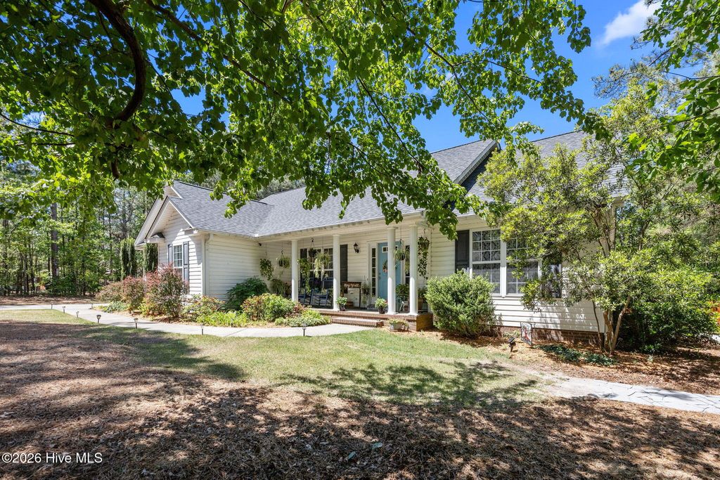 Photo of 1180 Rays Bridge Road, Whispering Pines, NC 28327 (MLS # 100584875)