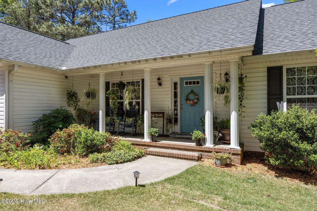 Photo of 1180 Rays Bridge Road, Whispering Pines, NC 28327 (MLS # 100584875)