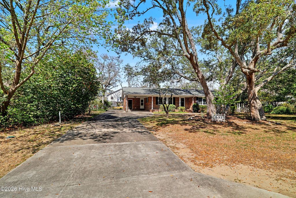 Photo of 101 NE 40th Street, Oak Island, NC 28465 (MLS # 100561205)