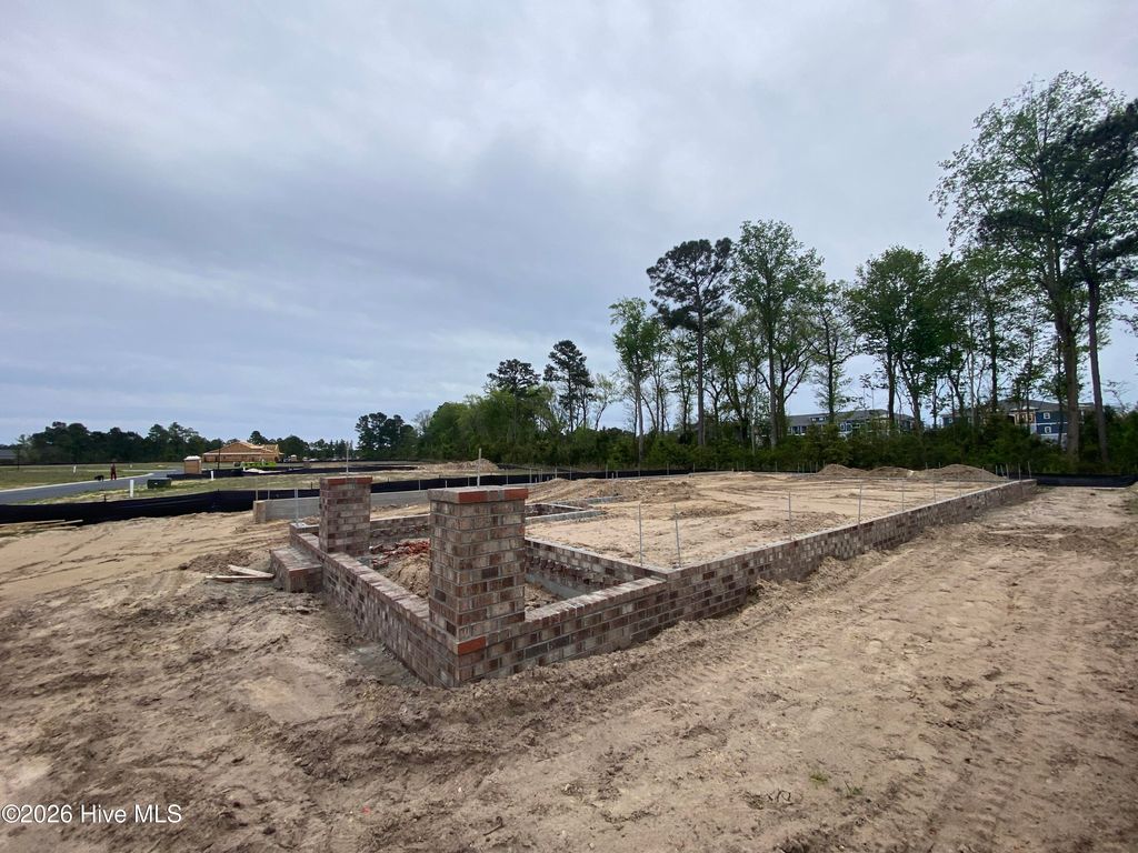 Photo of 3308 Island Lakes Drive, Oak Island, NC 28461 (MLS # 100560136)