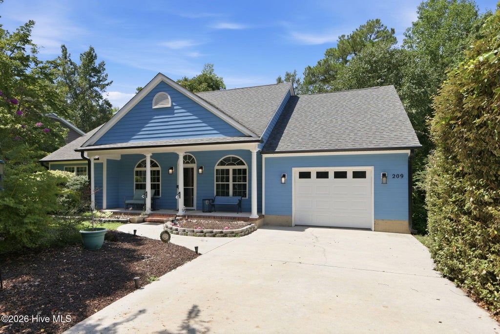 Photo of 209 N Holland Point Drive, Stella, NC 28582 (MLS # 100599561)