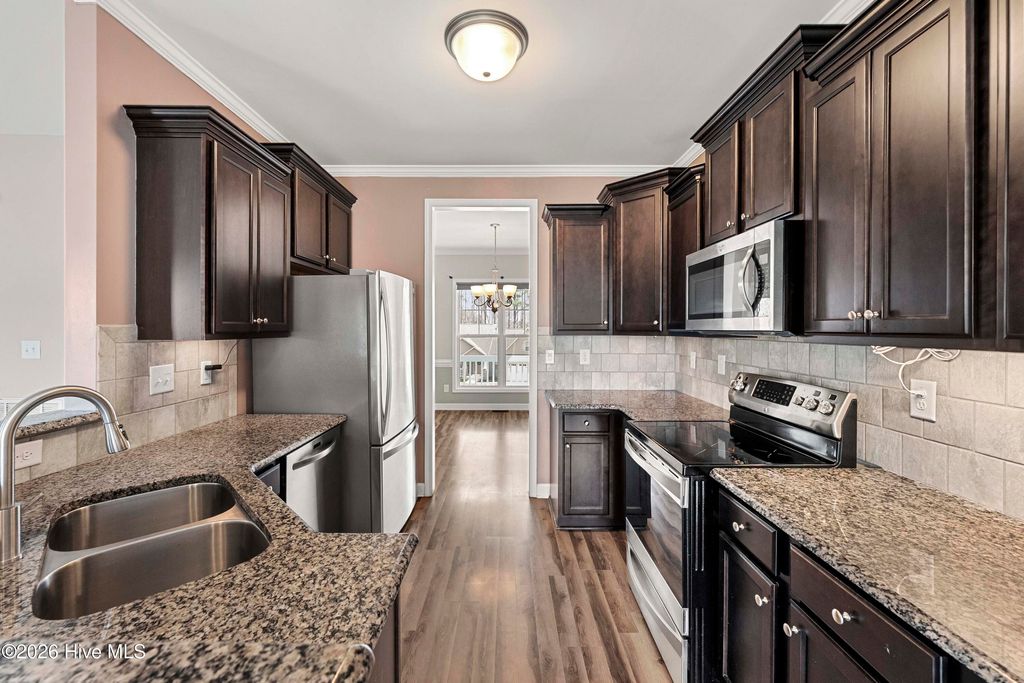 Photo of 293 Cotton Mill Drive, Zebulon, NC 27597 (MLS # 100559630)