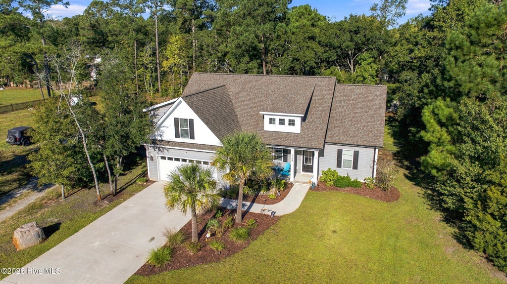 Photo of 126 Pebble Beach Drive, Hampstead, NC 28443 (MLS # 100612111)