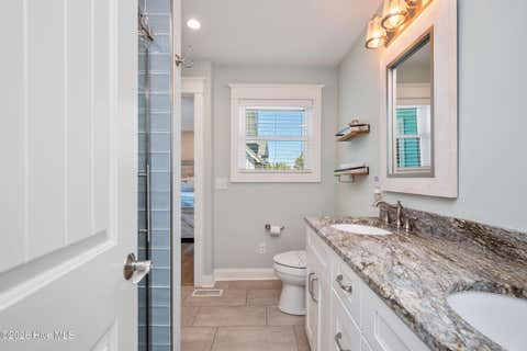 Tiny photo for 215 Caswell Beach Road, Caswell Beach, NC 28465 (MLS # 100591822)