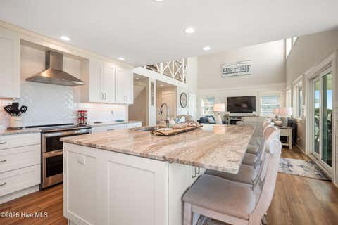 Tiny photo for 215 Caswell Beach Road, Caswell Beach, NC 28465 (MLS # 100591822)