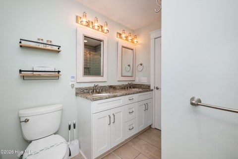 Tiny photo for 215 Caswell Beach Road, Caswell Beach, NC 28465 (MLS # 100591822)
