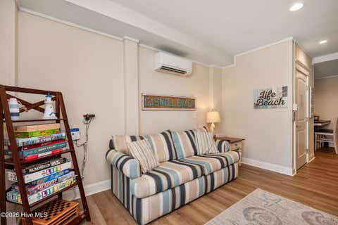 Tiny photo for 215 Caswell Beach Road, Caswell Beach, NC 28465 (MLS # 100591822)