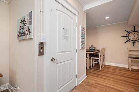 Tiny photo for 215 Caswell Beach Road, Caswell Beach, NC 28465 (MLS # 100591822)