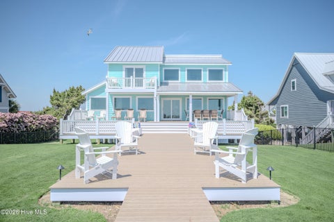 Tiny photo for 215 Caswell Beach Road, Caswell Beach, NC 28465 (MLS # 100591822)