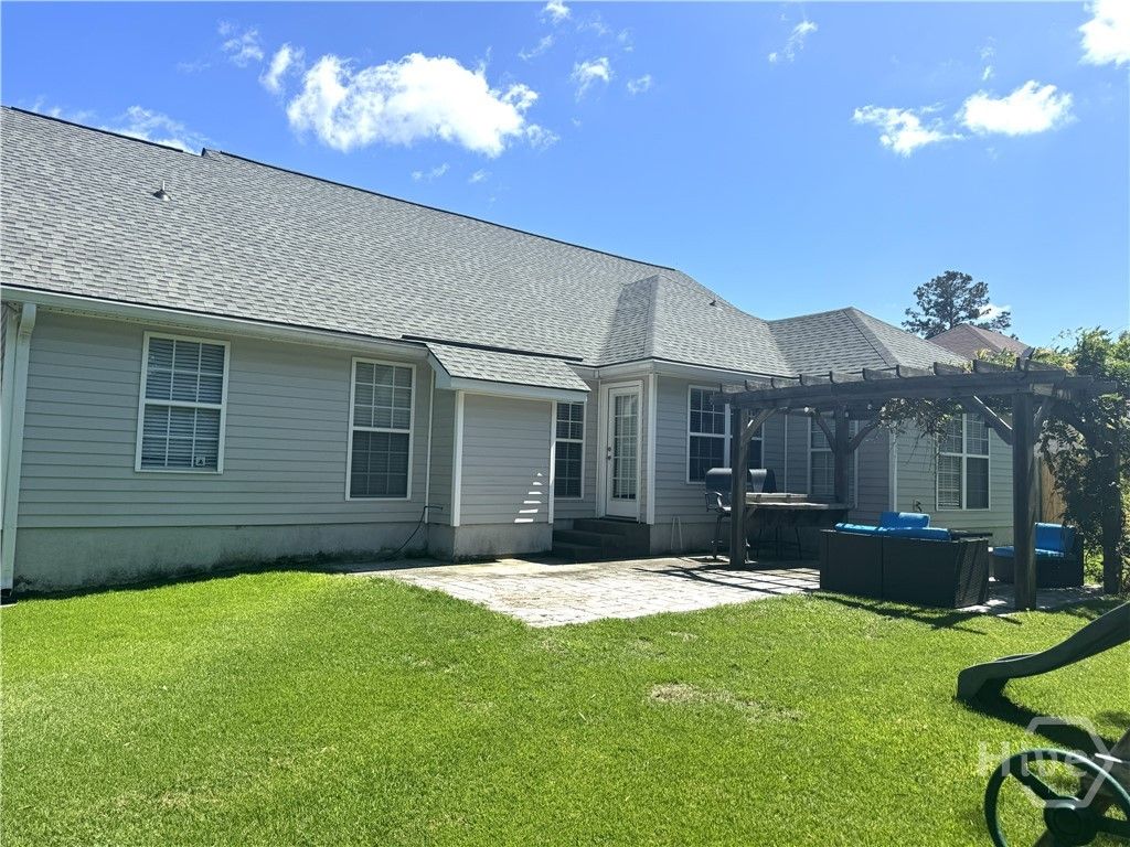 Photo of 259 Blue Lake Street, Richmond Hill, GA 31324 (MLS # SA356411)