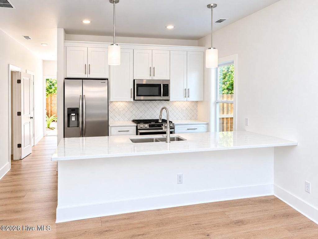 Photo of 9380 Night Harbor Drive SE, Leland, NC 28451 (MLS # 100613188)