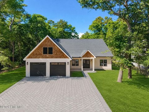 Photo of 138 Mimosa Boulevard, Pine Knoll Shores, NC 28512 (MLS # 100576267)