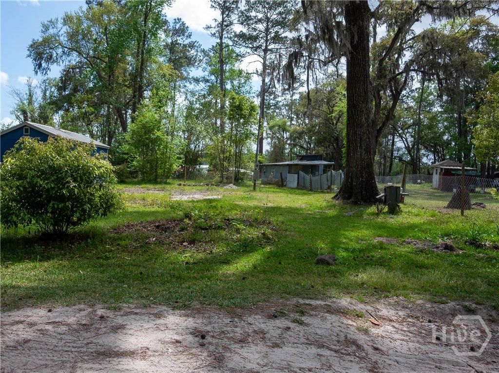 Photo of 54 Walnut Lane, Midway, GA 31320 (MLS # SA352915)