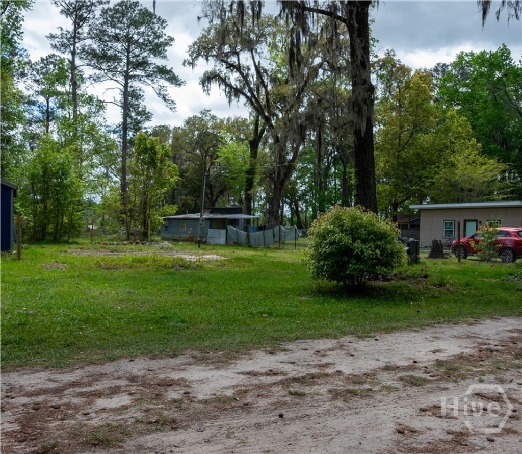 Photo of 54 Walnut Lane, Midway, GA 31320 (MLS # SA352915)