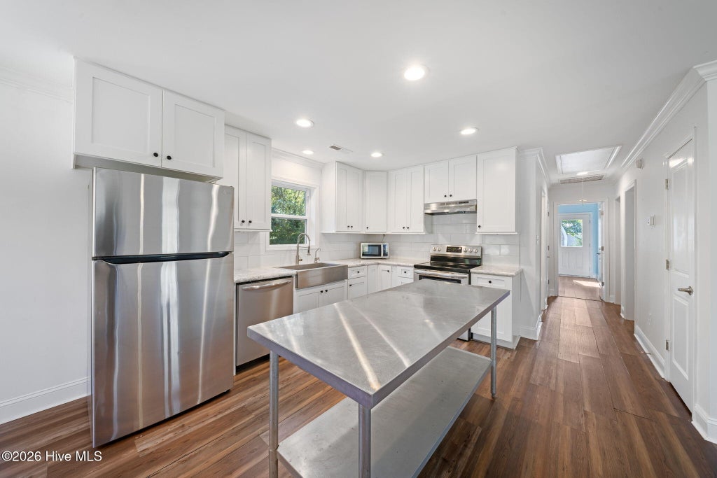 Photo of 404 Jamaica Drive, Hampstead, NC 28443 (MLS # 100607376)
