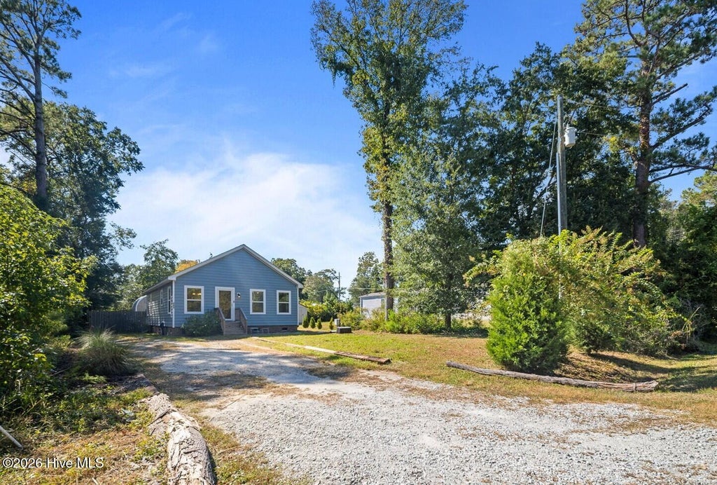 Photo of 404 Jamaica Drive, Hampstead, NC 28443 (MLS # 100607376)