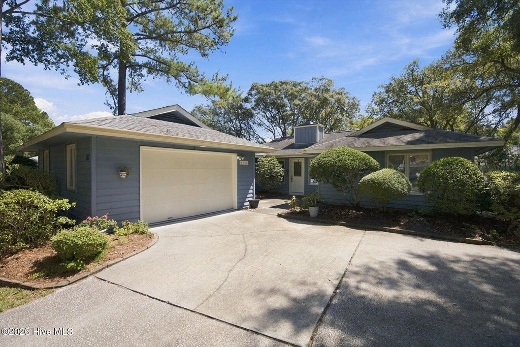 Photo of 611 Camellia Lane, Sunset Beach, NC 28468 (MLS # 100603600)