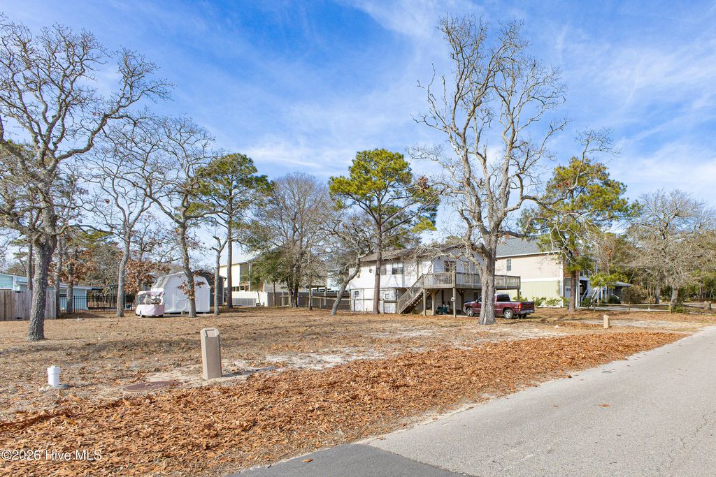 Photo of 133 NE 7th Street, Oak Island, NC 28465 (MLS # 100550545)