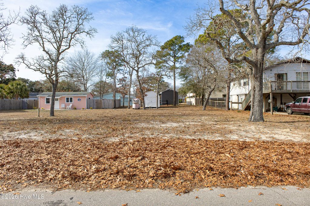 Photo of 133 NE 7th Street, Oak Island, NC 28465 (MLS # 100550545)