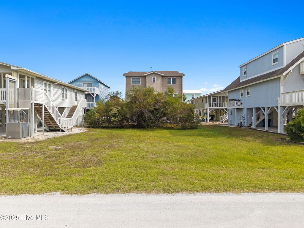 Photo of 421 1st Street, Sunset Beach, NC 28468 (MLS # 100542339)