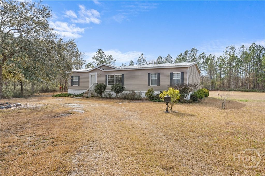 Photo of 777 Zittrouer Road, Guyton, GA 31312 (MLS # SA344115)