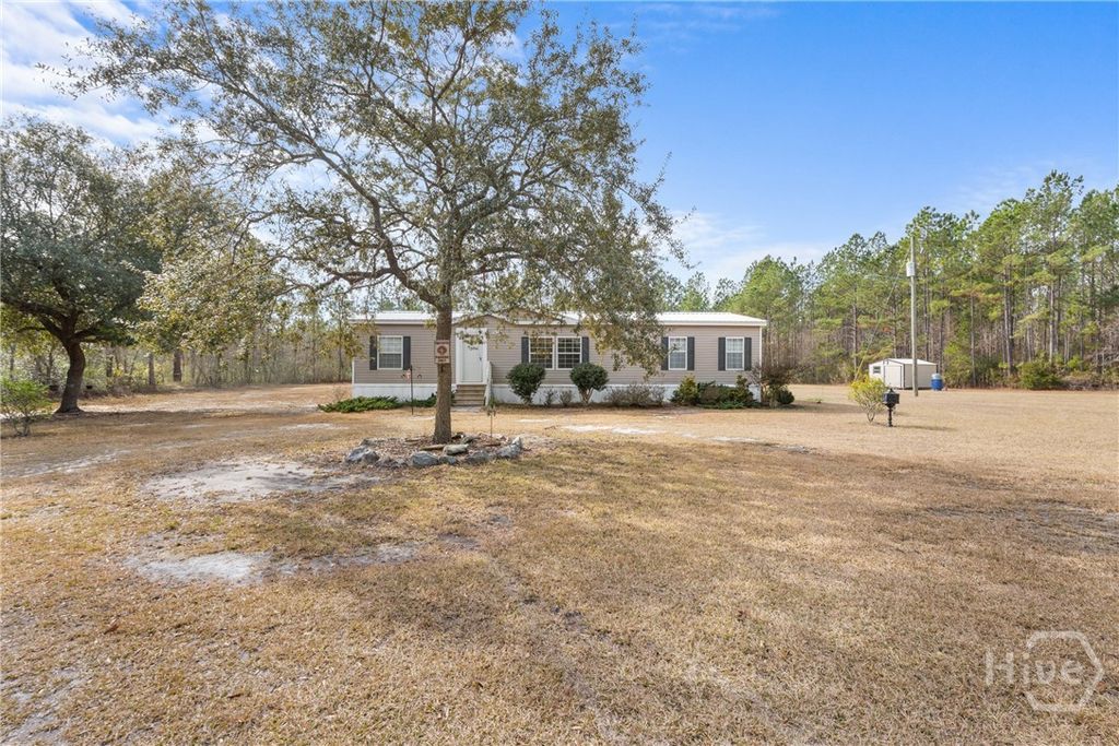 Photo of 777 Zittrouer Road, Guyton, GA 31312 (MLS # SA344115)
