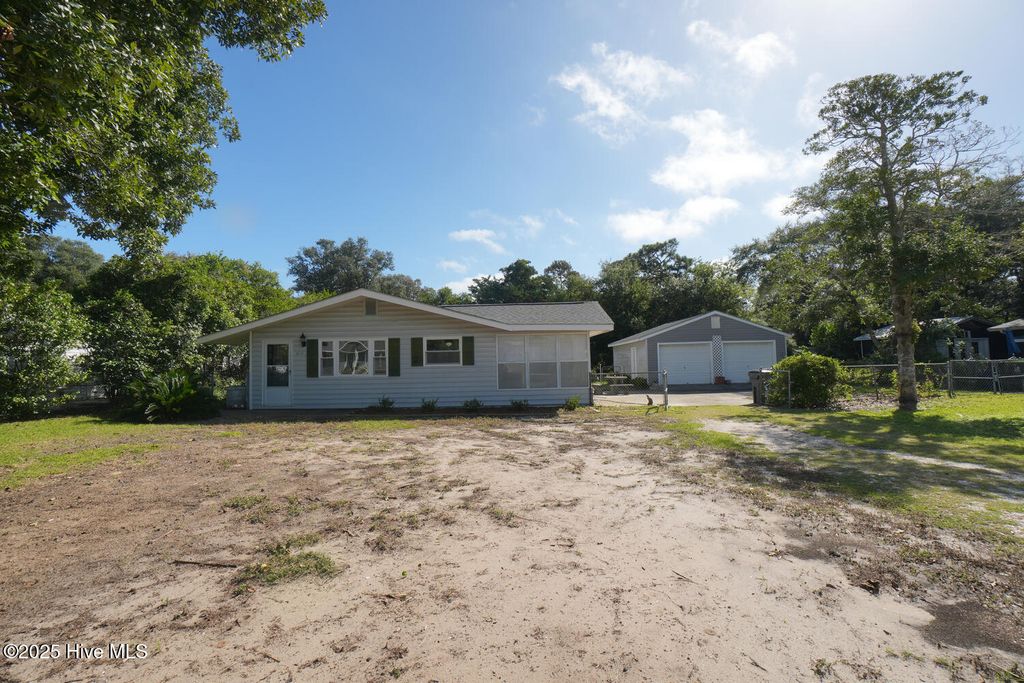 Photo of 424 Trott Street, Oak Island, NC 28465 (MLS # 100534449)