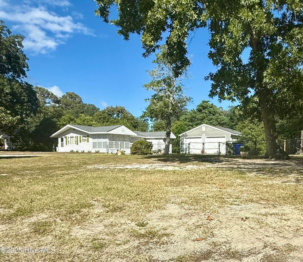 Photo of 424 Trott Street, Oak Island, NC 28465 (MLS # 100534449)