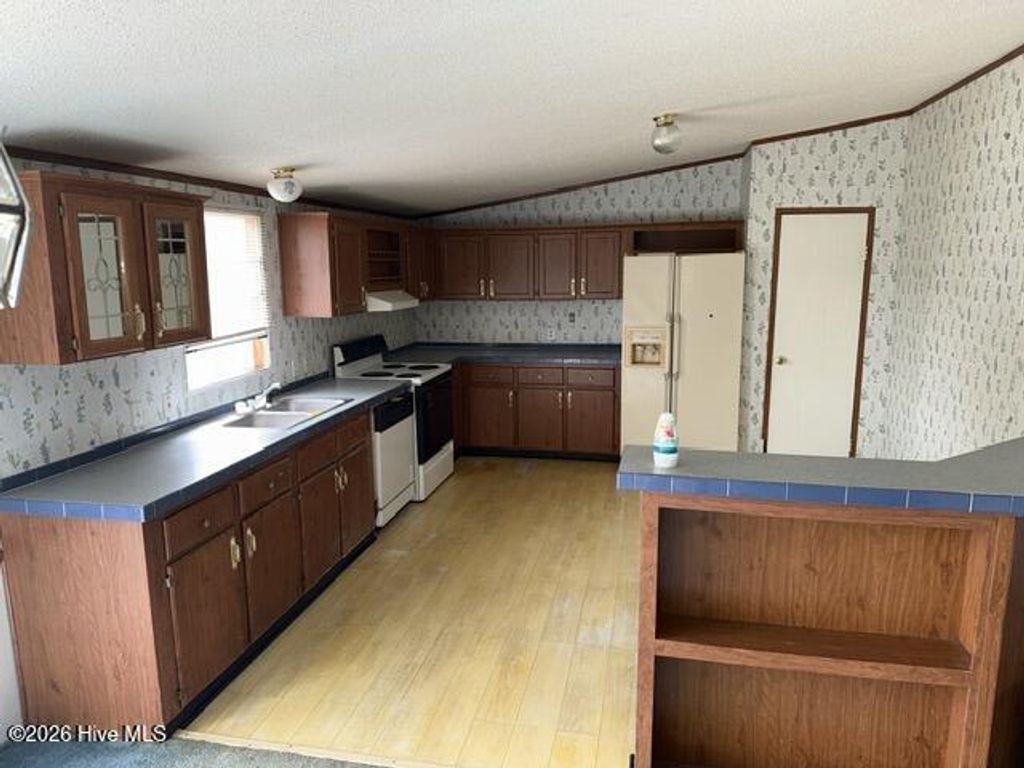 Photo of 559 Halls Creek Road, New Bern, NC 28560 (MLS # 100556610)