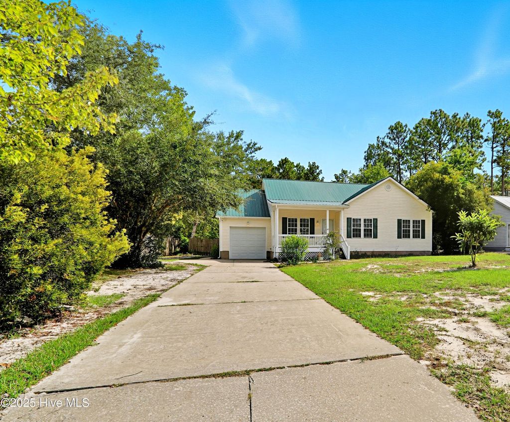 Photo of 71 W South Shore Drive, Southport, NC 28461 (MLS # 100529076)