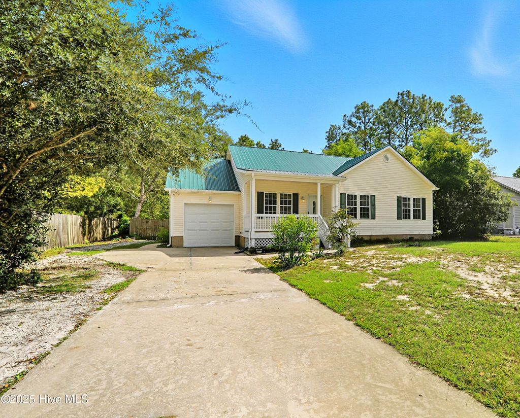 Photo of 71 W South Shore Drive, Southport, NC 28461 (MLS # 100529076)