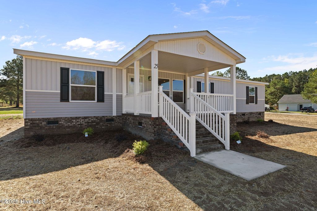 Photo of 25 Old Pebble Lane, Kenly, NC 27542 (MLS # 100561332)