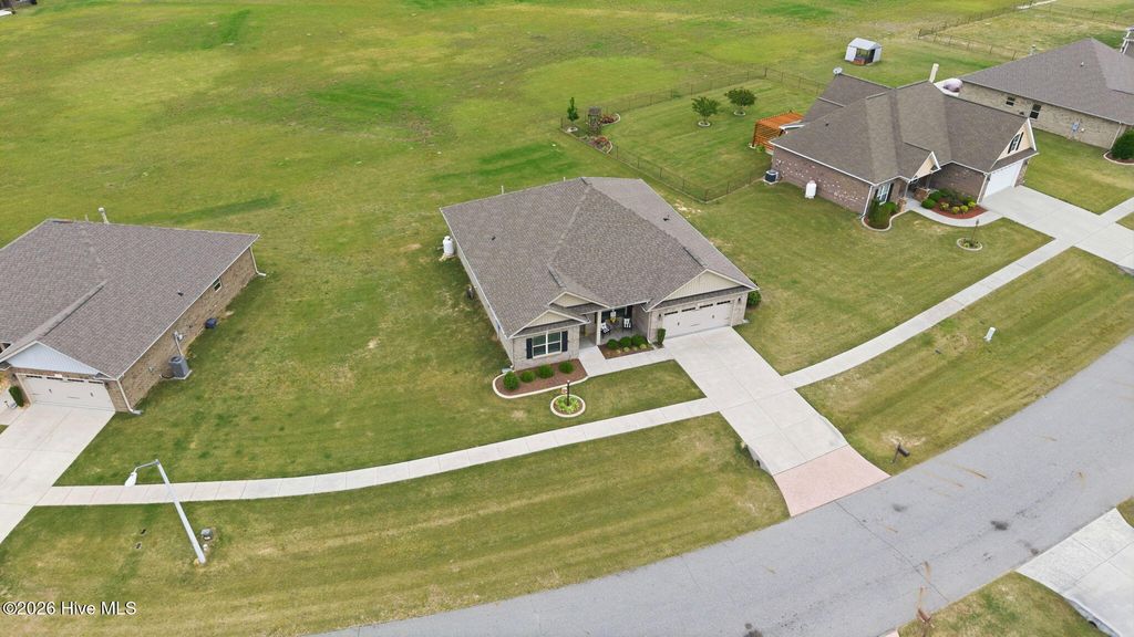 Photo of 305 S Merganser Drive, Pikeville, NC 27863 (MLS # 100573926)