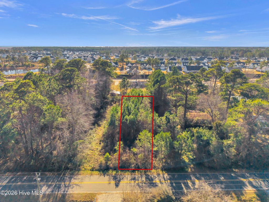 Photo of 552 Lea Drive, Hampstead, NC 28443 (MLS # 100549474)