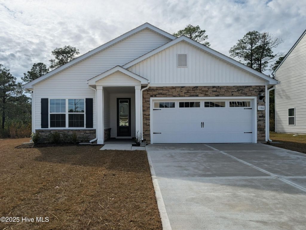 Photo of 146 S Umbrella Palm Drive, Hampstead, NC 28443 (MLS # 100548267)