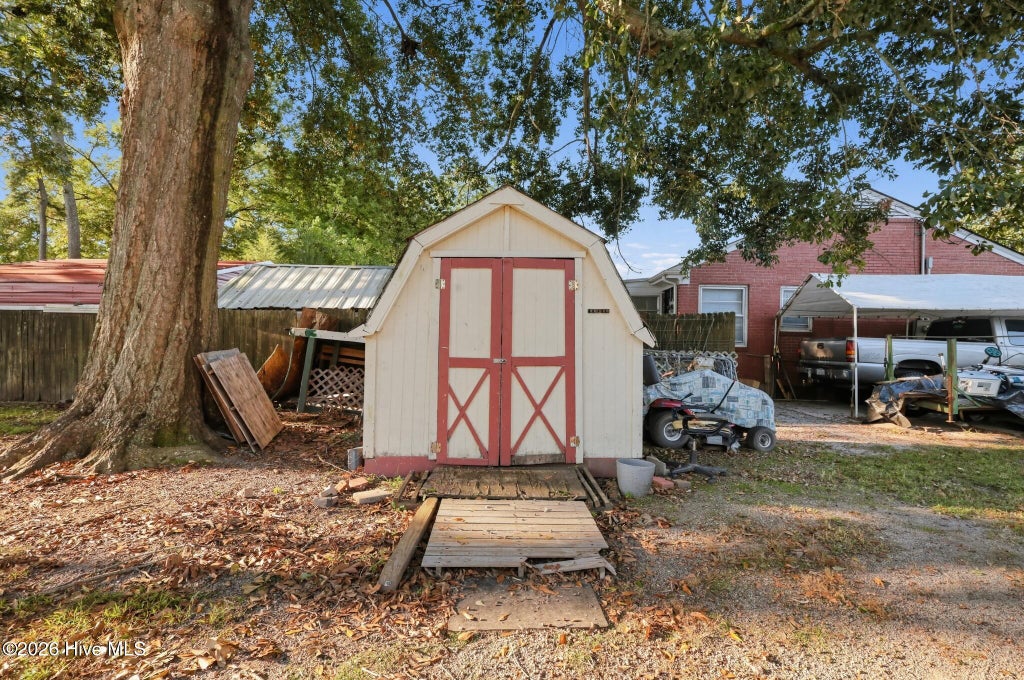 Photo of 201 S Pender Street, Elm City, NC 27822 (MLS # 100612375)