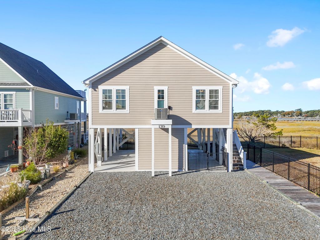 Photo of 139 Seagull Drive, Holden Beach, NC 28462 (MLS # 100541984)