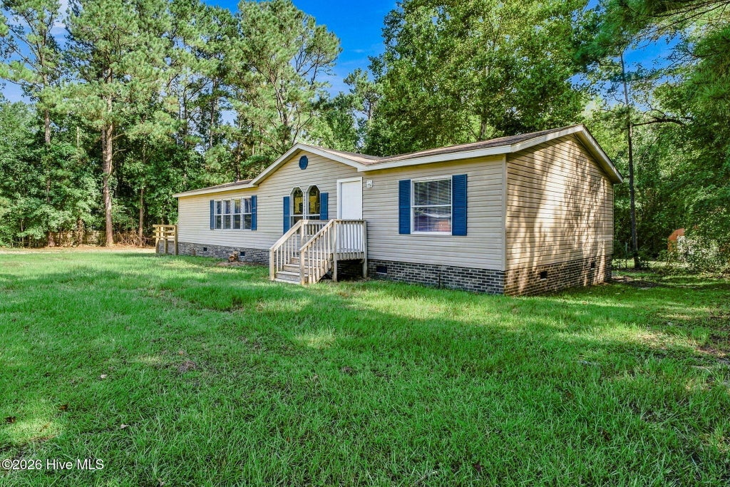 Photo of 5612 Deerfield Place NE, Winnabow, NC 28479 (MLS # 100603750)
