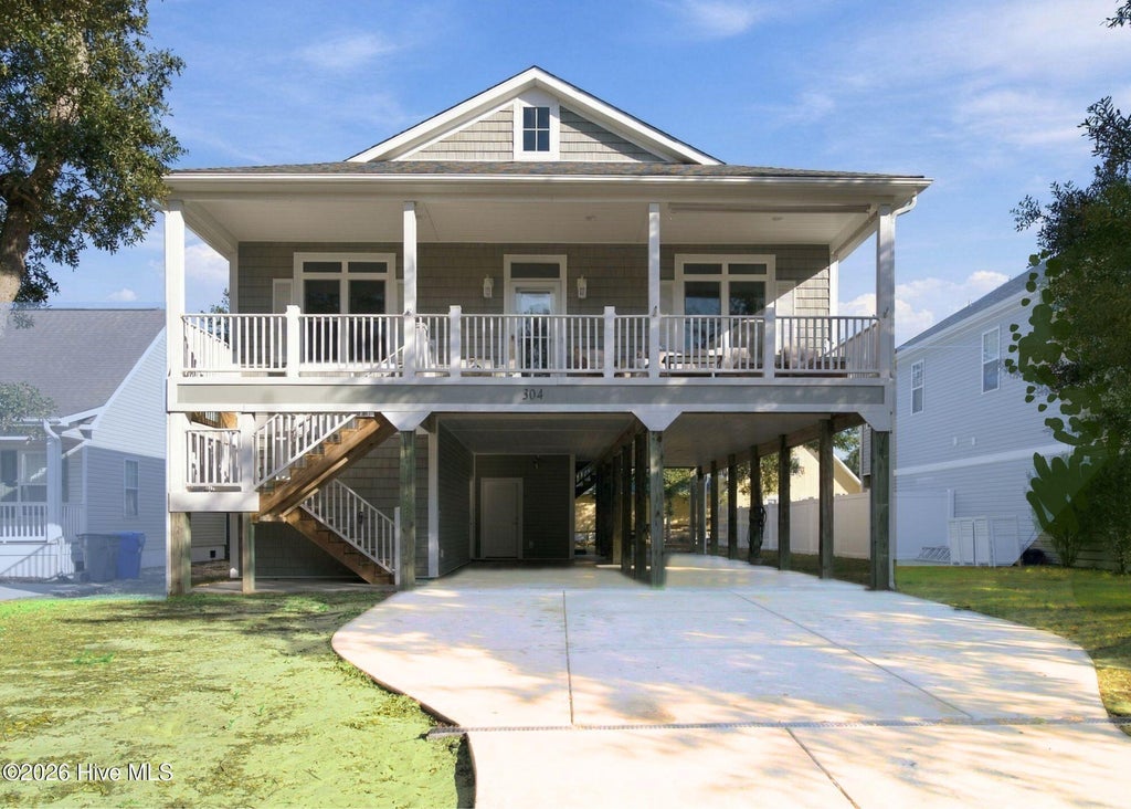 Photo of 304 NE 47th Street, Oak Island, NC 28465 (MLS # 100612461)