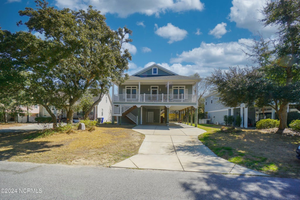 Photo of 304 NE 47th Street, Oak Island, NC 28465 (MLS # 100612461)