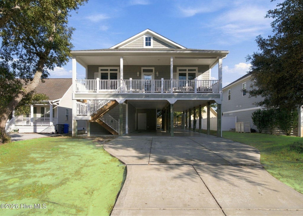 Photo of 304 NE 47th Street, Oak Island, NC 28465 (MLS # 100612461)