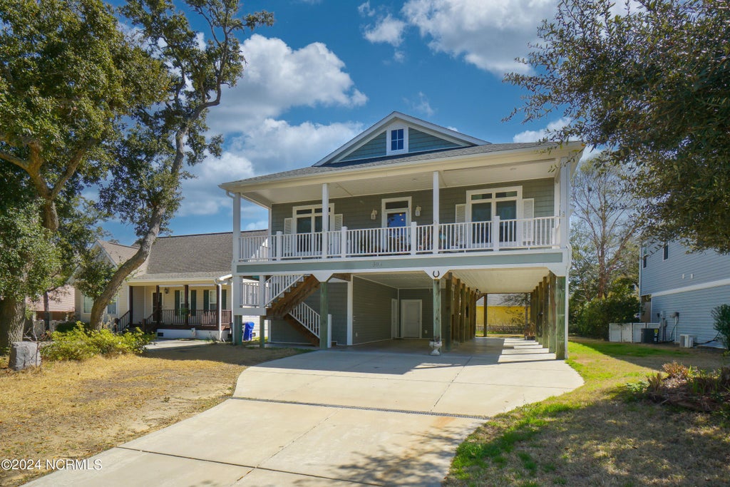 Photo of 304 NE 47th Street, Oak Island, NC 28465 (MLS # 100612461)