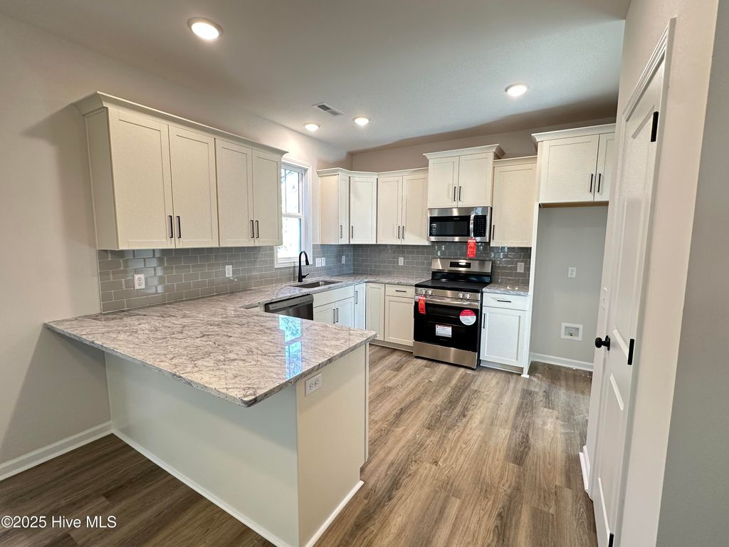 Photo of 3034 River Hills Drive SW, Shallotte, NC 28470 (MLS # 100489344)